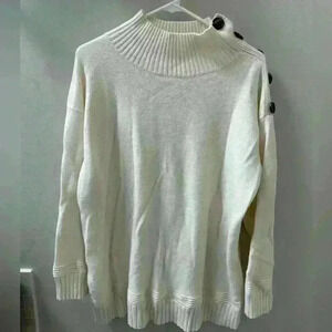 Woman's anthropology sweater size large. Cream color with open button neck line